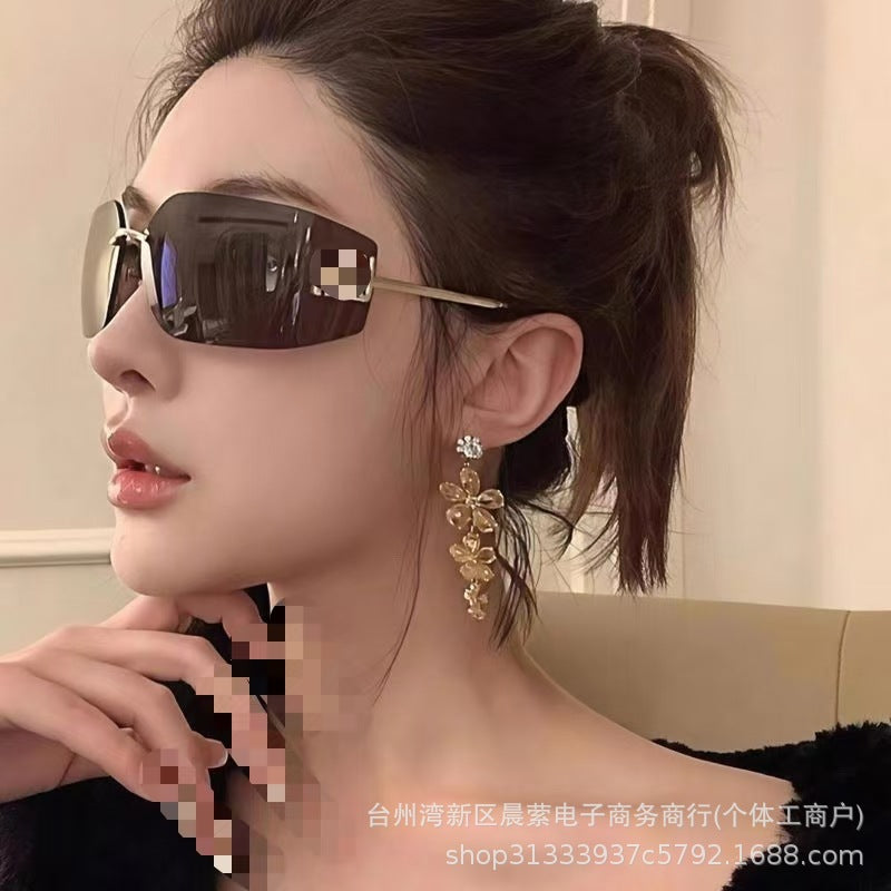 Frameless Oversized Sunglasses for Women with UV400 Protection  Description:
