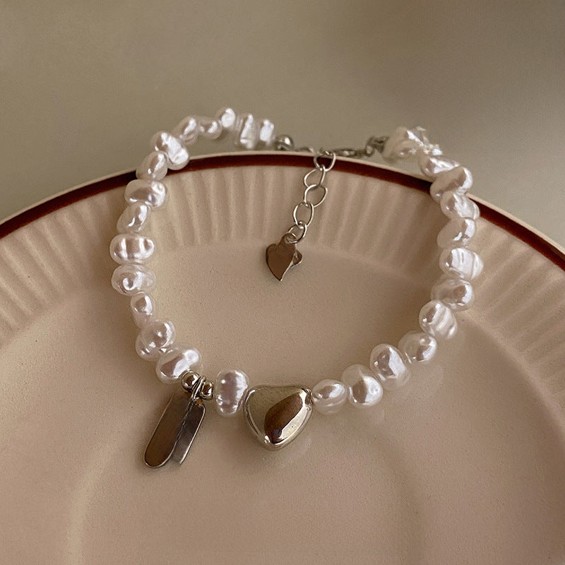 Baroque Pearl Heart Charm Bracelet – Sweet & Bold Style